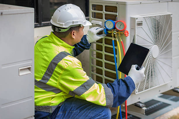 Professional Hvac technician working in Rockville Centre, NY